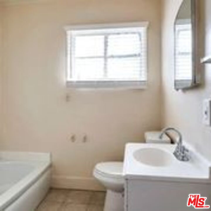 4063 Abourne Road, Unit B Los Angeles, CA 90008 - Photo 9 of 9 a bathroom with a sink and a toilet