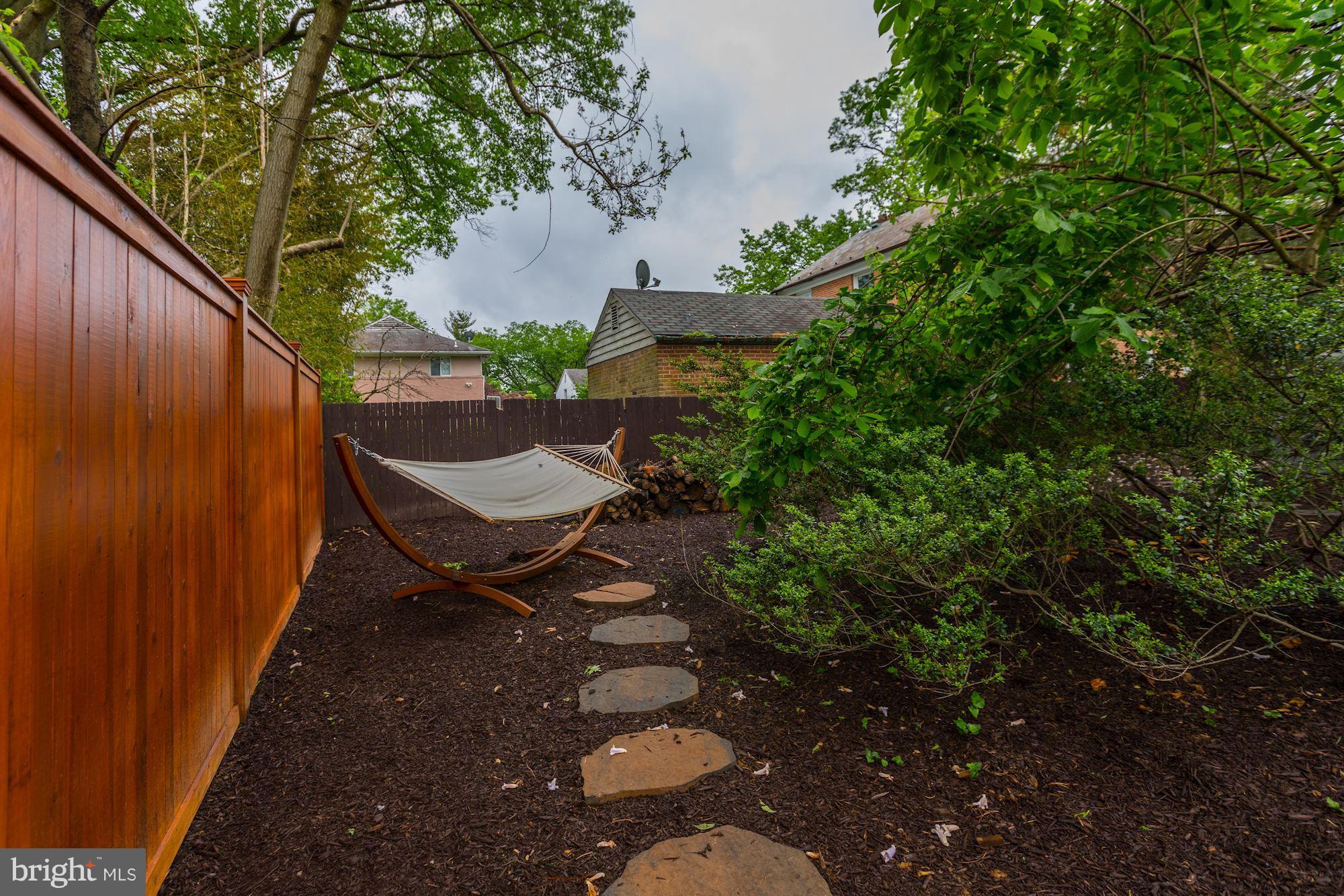 4949 Allan Road Bethesda, MD 20816 - Photo 23 of 27 a garden view with a seating space