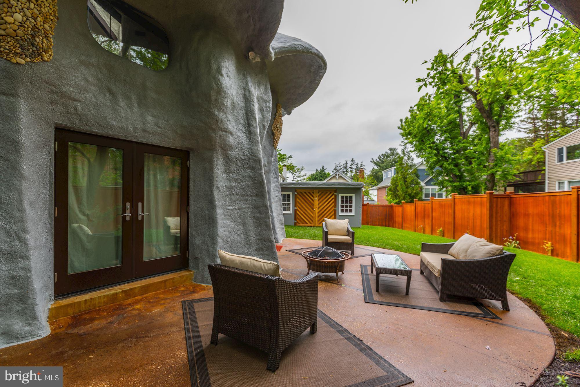4949 Allan Road Bethesda, MD 20816 - Photo 24 of 27 a view of a backyard with sitting area