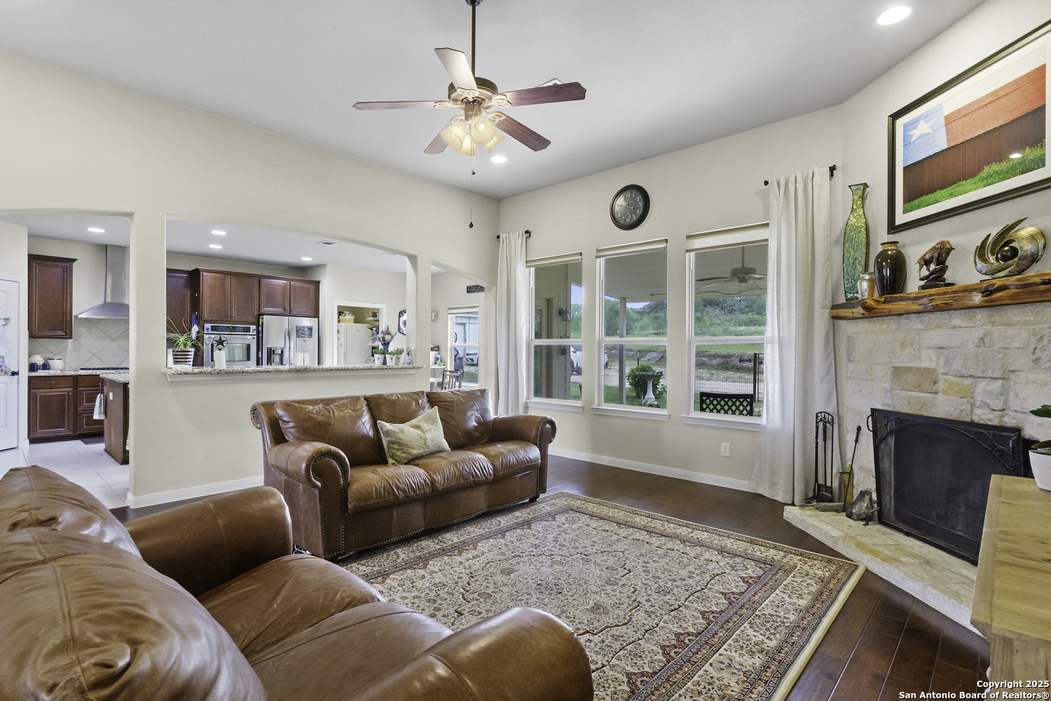 187 Tracks Center Point, TX 78010 - Photo 19 of 42 a living room with furniture and a fireplace