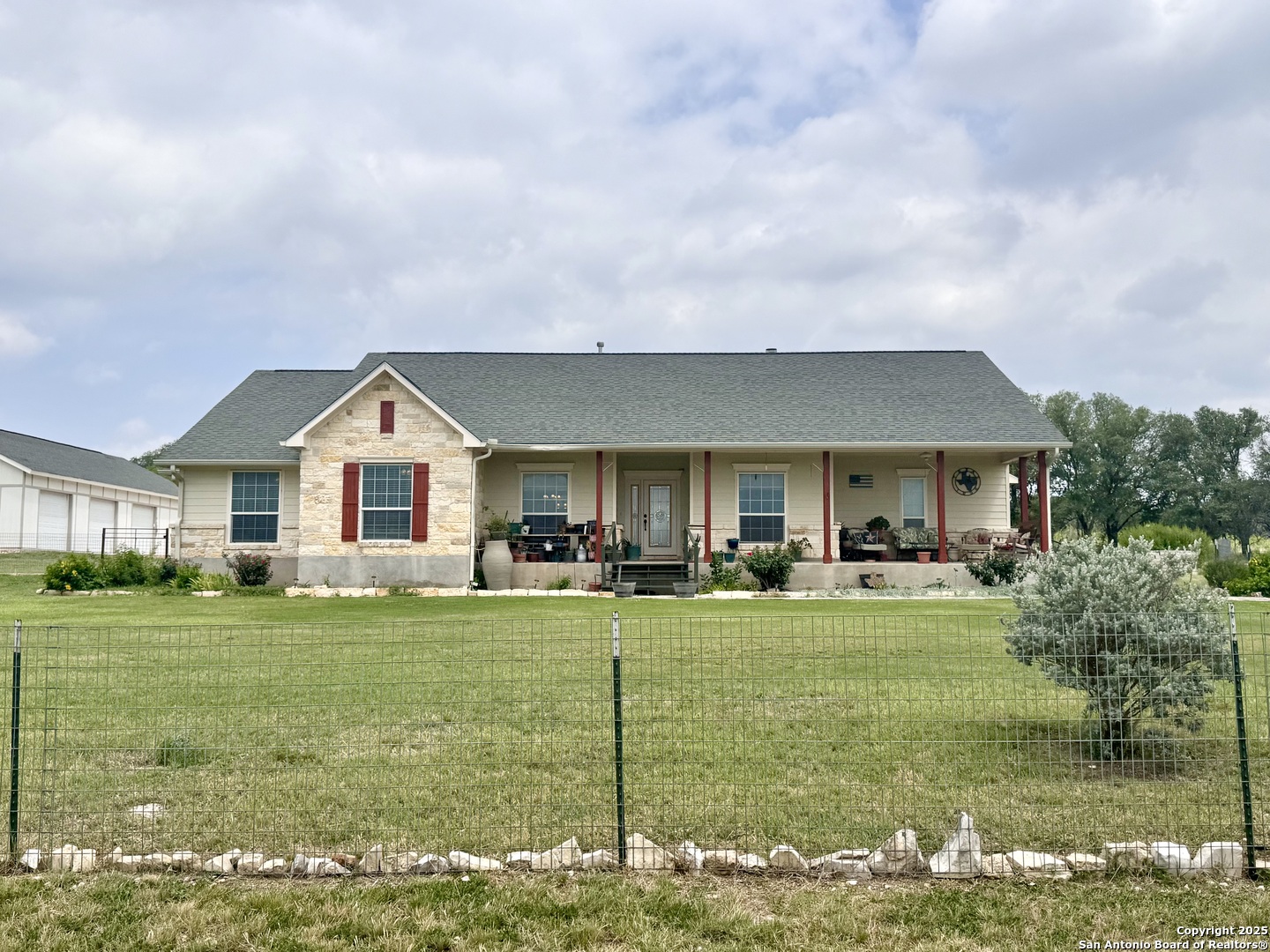 187 Tracks Center Point, TX 78010 - Photo 2 of 42 a front view of a house with garden