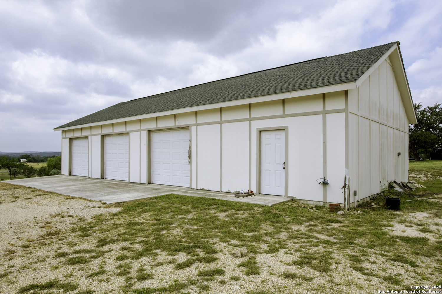 187 Tracks Center Point, TX 78010 - Photo 3 of 42 a view of a house with backyard