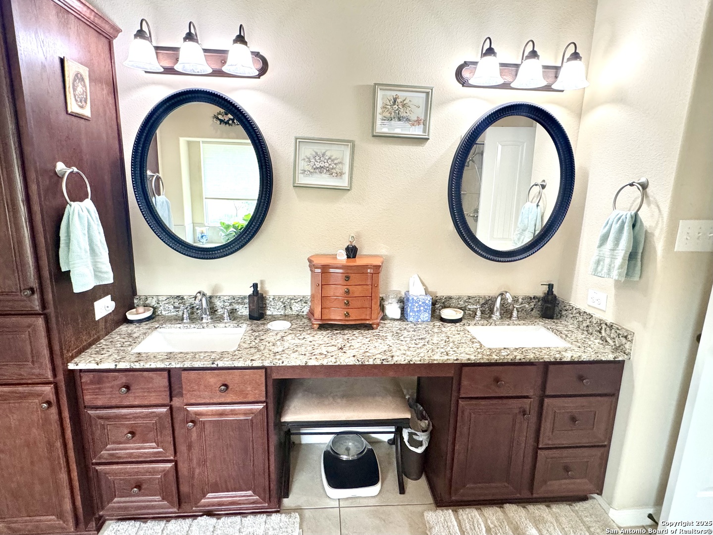 187 Tracks Center Point, TX 78010 - Photo 33 of 42 a bathroom with a granite countertop double vanity sink and a mirror