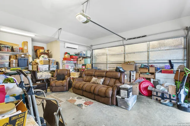 a living room with lots of furniture