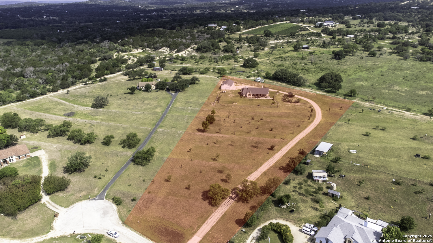 187 Tracks Center Point, TX 78010 - Photo 4 of 42 a view of a swimming pool with a yard