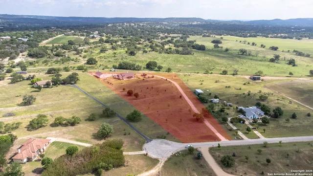 a view of a city with an ocean