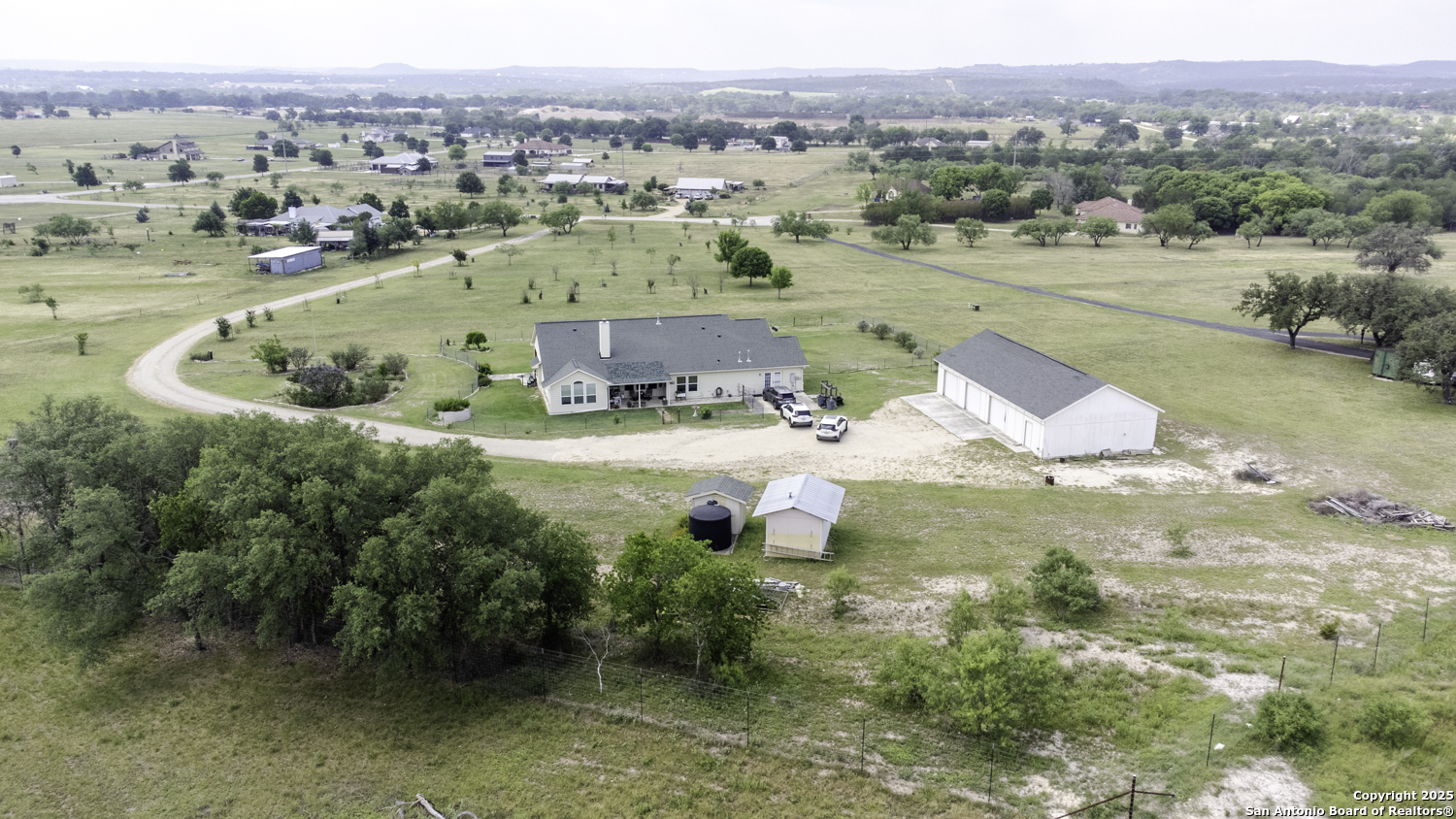 187 Tracks Center Point, TX 78010 - Photo 42 of 42 an aerial view of residential houses with outdoor space and swimming pool