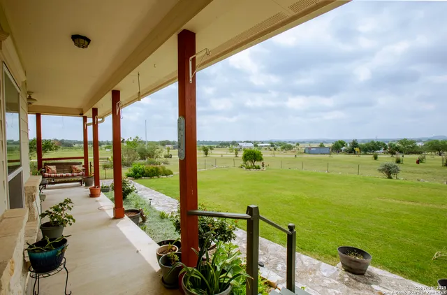 a view of a balcony with ocean view