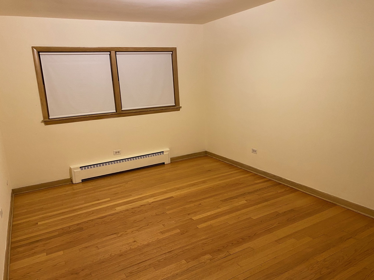 5930 North Odell Avenue, Unit GB Chicago, IL 60631 - Photo 3 of 6 a view of a room with wooden floor