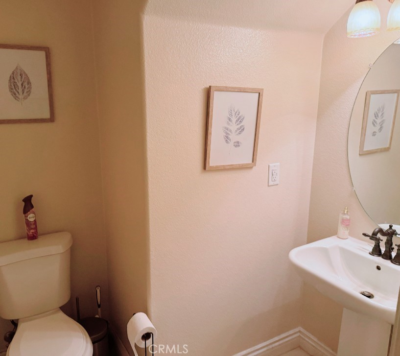 8692 East 9th Street, Unit 29 Rancho Cucamonga, CA 91730 - Photo 11 of 23 Downstairs Powder Room