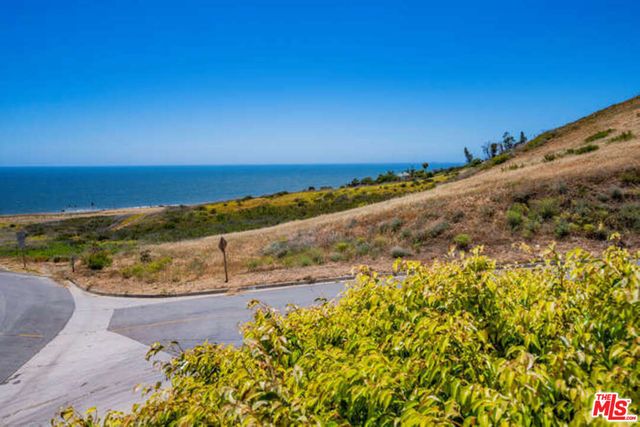 a view of a lake with a mountain