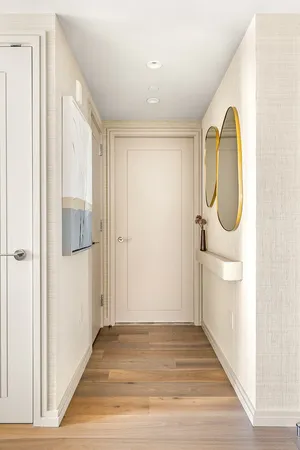 a view of a bathroom with sink and mirror