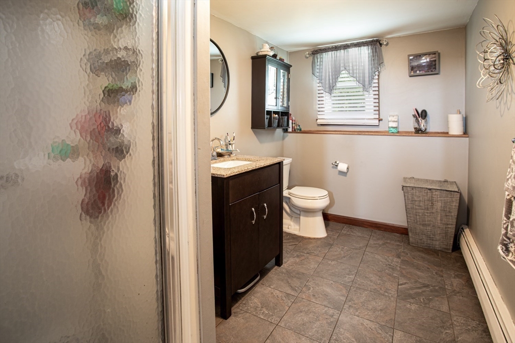 166 Stonehaven Road Fall River, MA 02723 - Photo 20 of 33 a bathroom with a sink toilet and shower