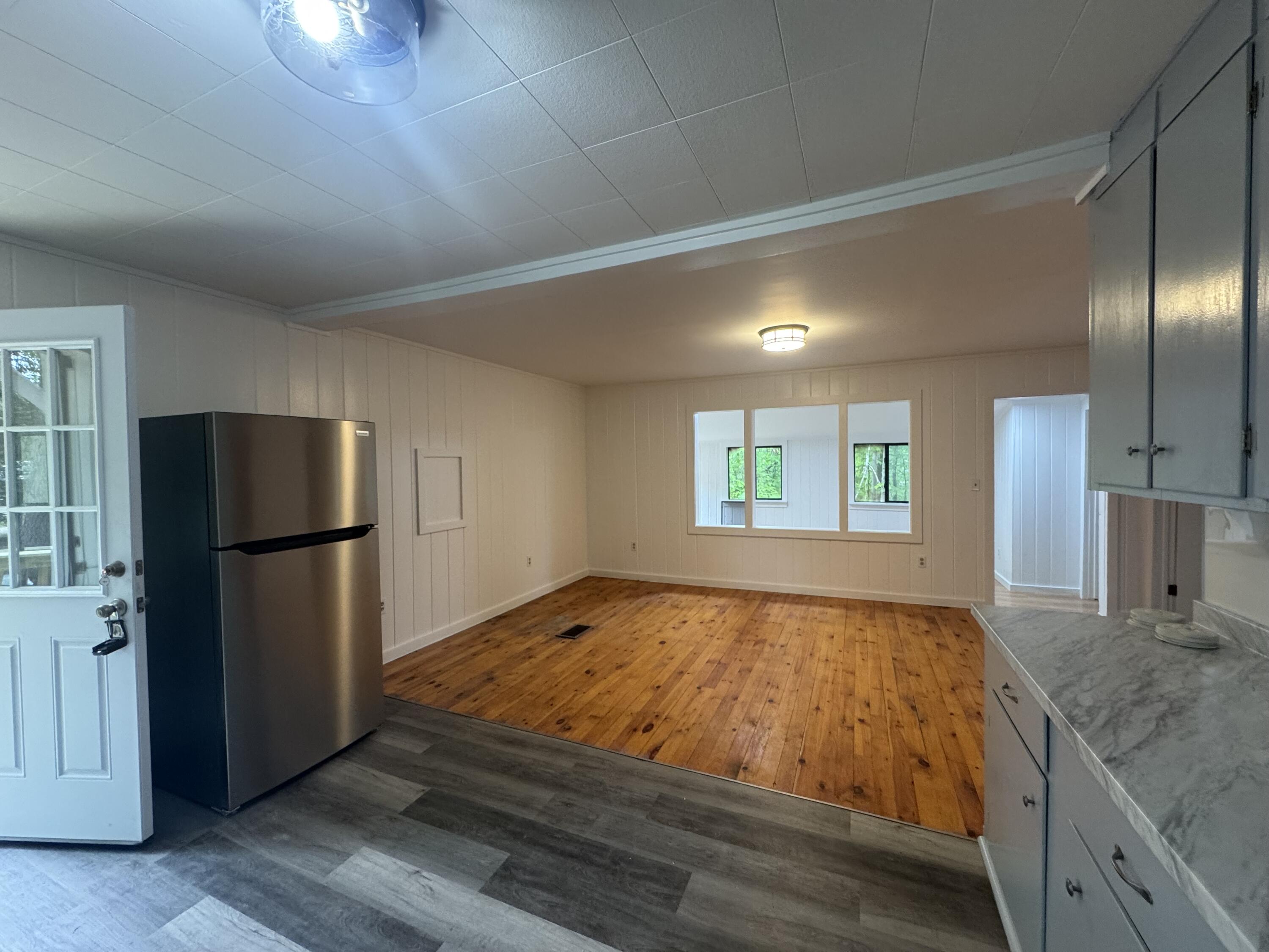 140 Central Avenue Limerick, ME 04048 - Photo 3 of 13 Central kitchen into living