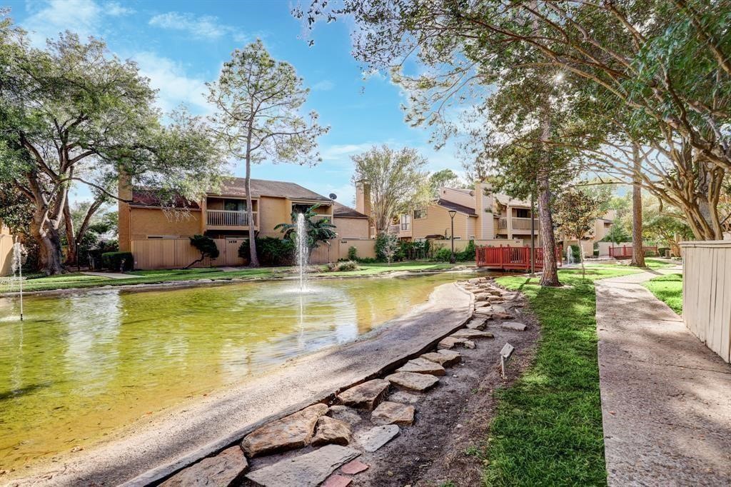 3616 Ocee Street Houston, TX 77063 - Photo 12 of 12 a view of a swimming pool with a patio