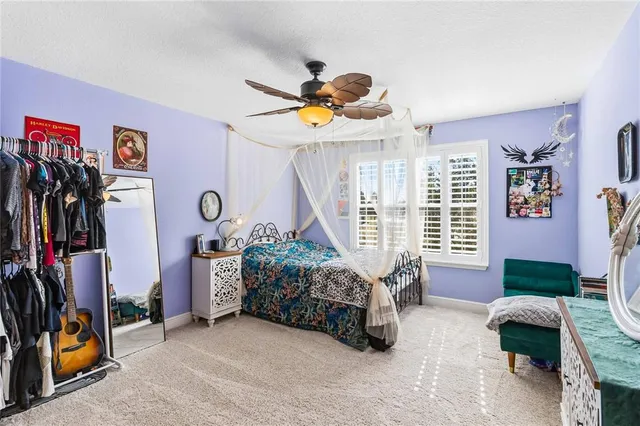 a view of storage and utility room with washer and dryer
