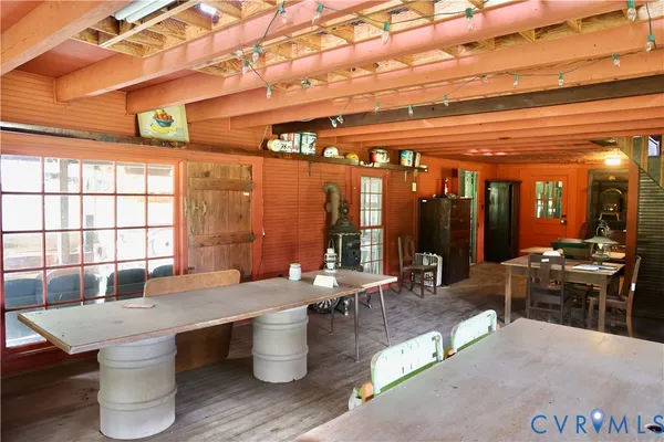 a room with lots of wooden furniture