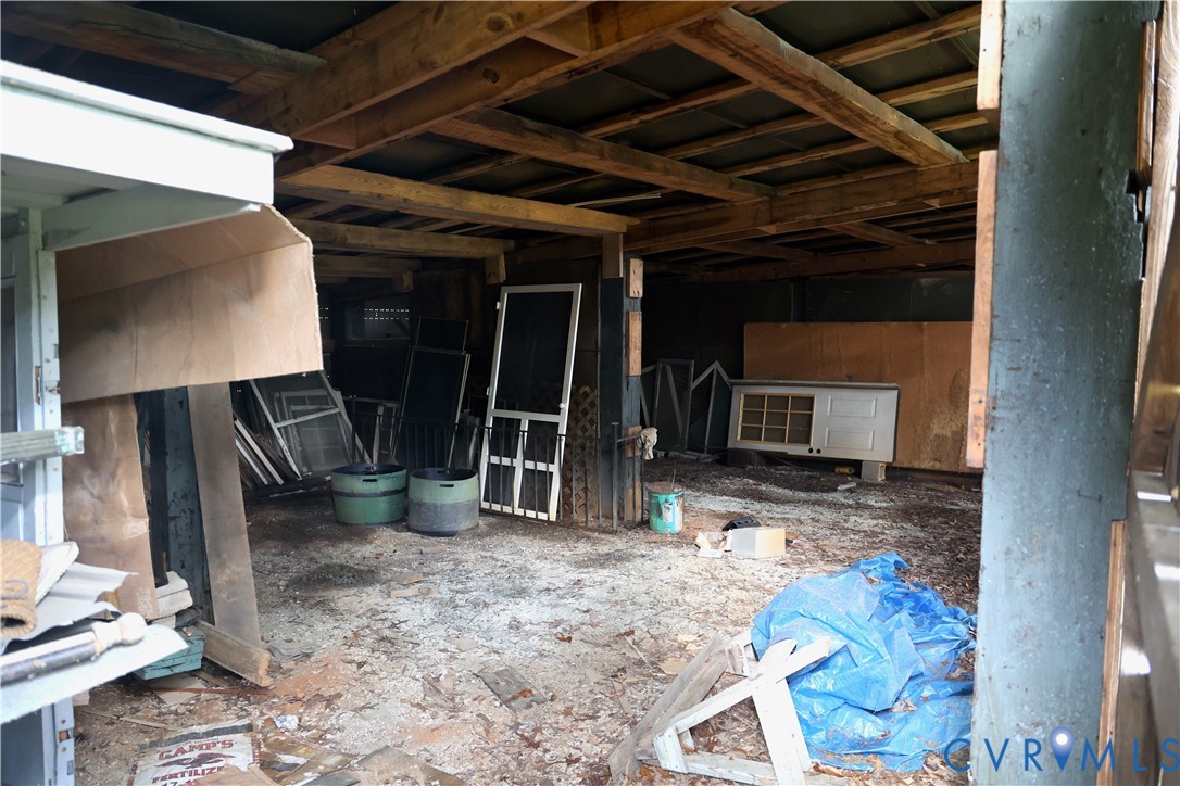7246 MacDonald Road Scottsburg, VA 24589 - Photo 42 of 46 a view of an empty room with wooden floor