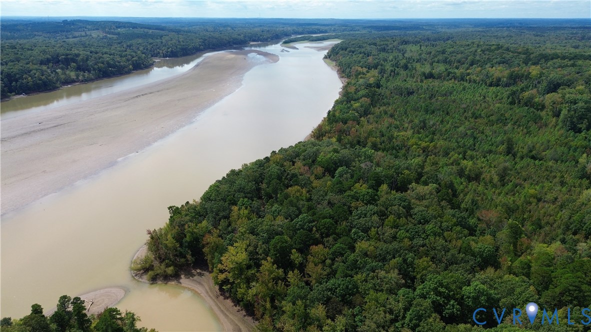 7246 MacDonald Road Scottsburg, VA 24589 - Photo 10 of 46 an aerial view of a house with a yard and lake view