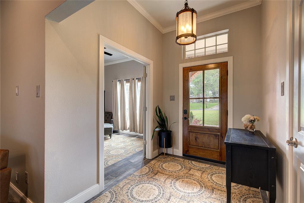 2027 Park Springs Road Sulphur Springs, TX 75482 - Photo 4 of 39 a view of hall way with furniture and windows
