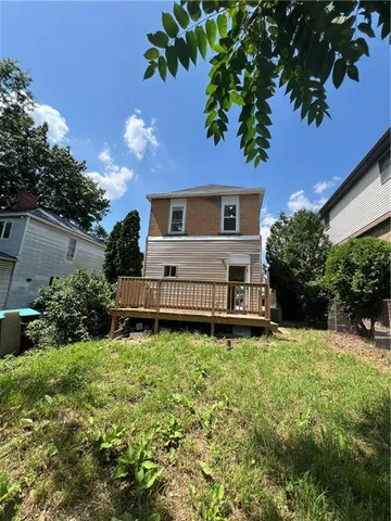 a house view with a garden space
