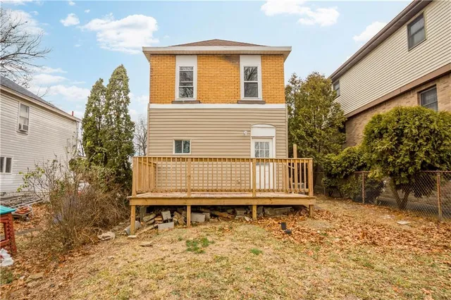 a house with trees in front of it