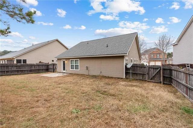 a house view with a garden space