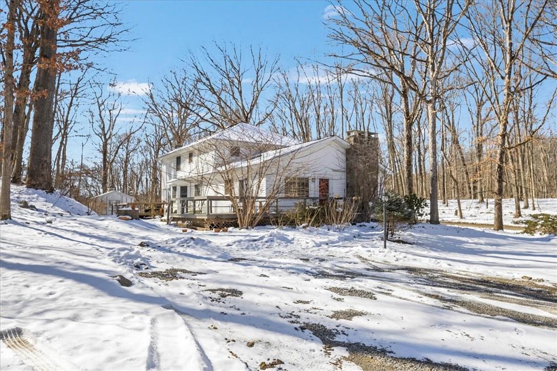 21 Har Mill Drive Cold Spring, NY 10516 - Photo 1 of 1 a view of a house with a yard covered in snow
