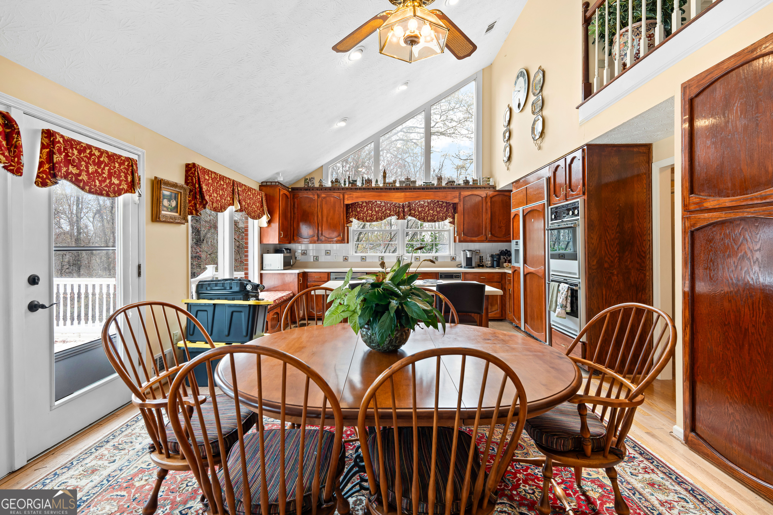 296 Ebenezer Church Road Fayetteville, GA 30215 - Photo 13 of 66 a view of a dining room with furniture window and wooden floor