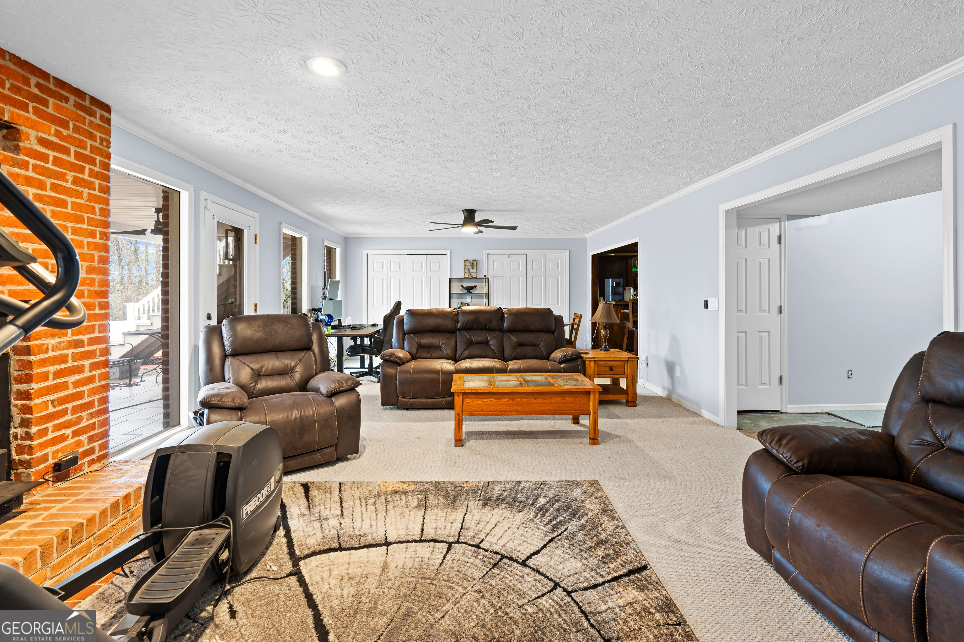 296 Ebenezer Church Road Fayetteville, GA 30215 - Photo 15 of 66 a living room with furniture and a wooden floor