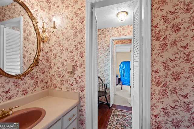 a bedroom with bed and a window