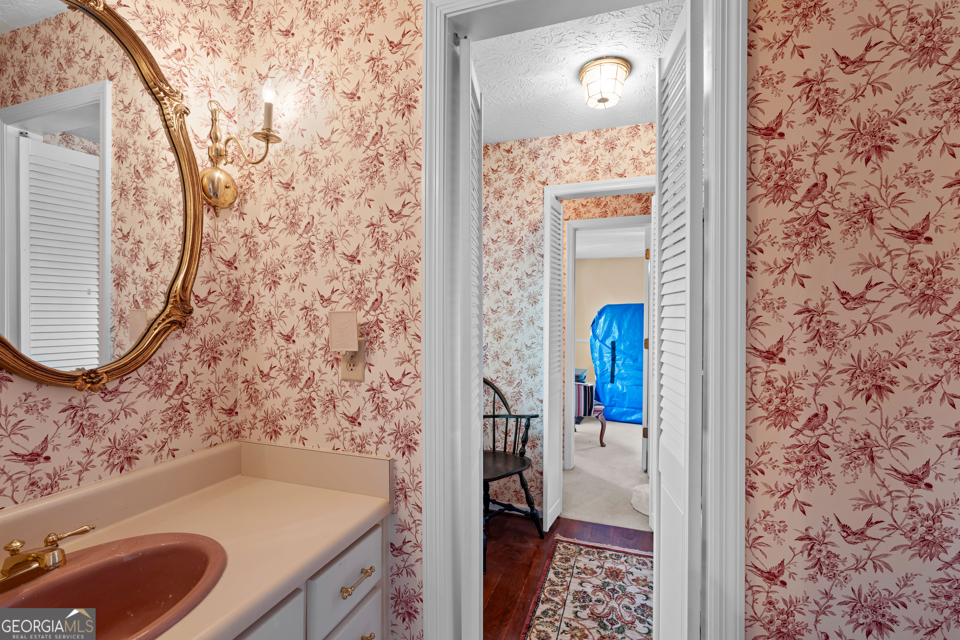 296 Ebenezer Church Road Fayetteville, GA 30215 - Photo 22 of 66 a bathroom with a tub sink and mirror