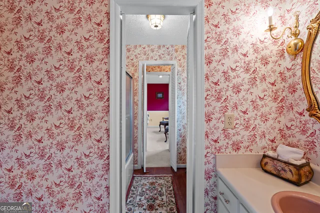 a bathroom with a toilet and a sink