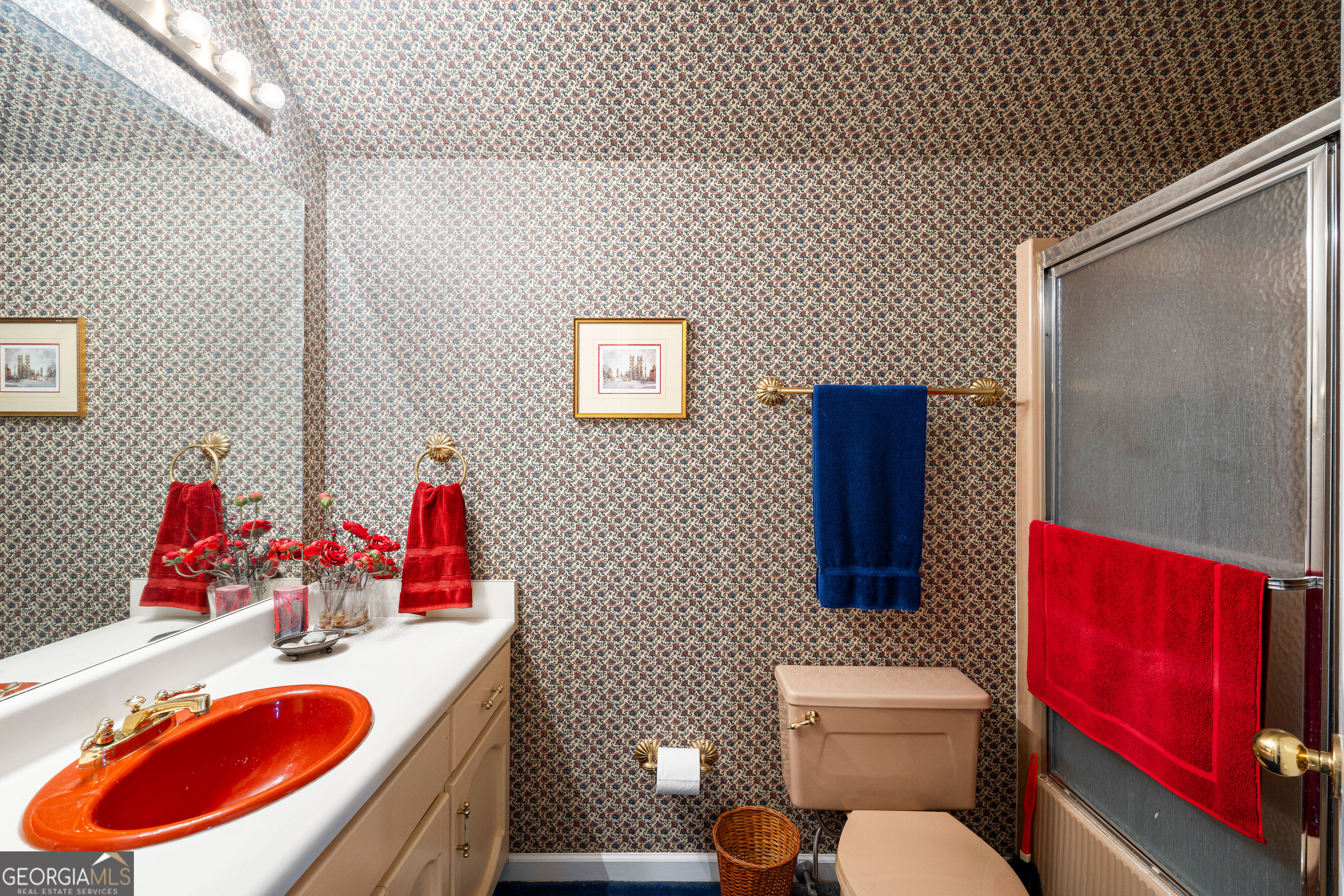 296 Ebenezer Church Road Fayetteville, GA 30215 - Photo 27 of 66 a bathroom with a toilet and a sink