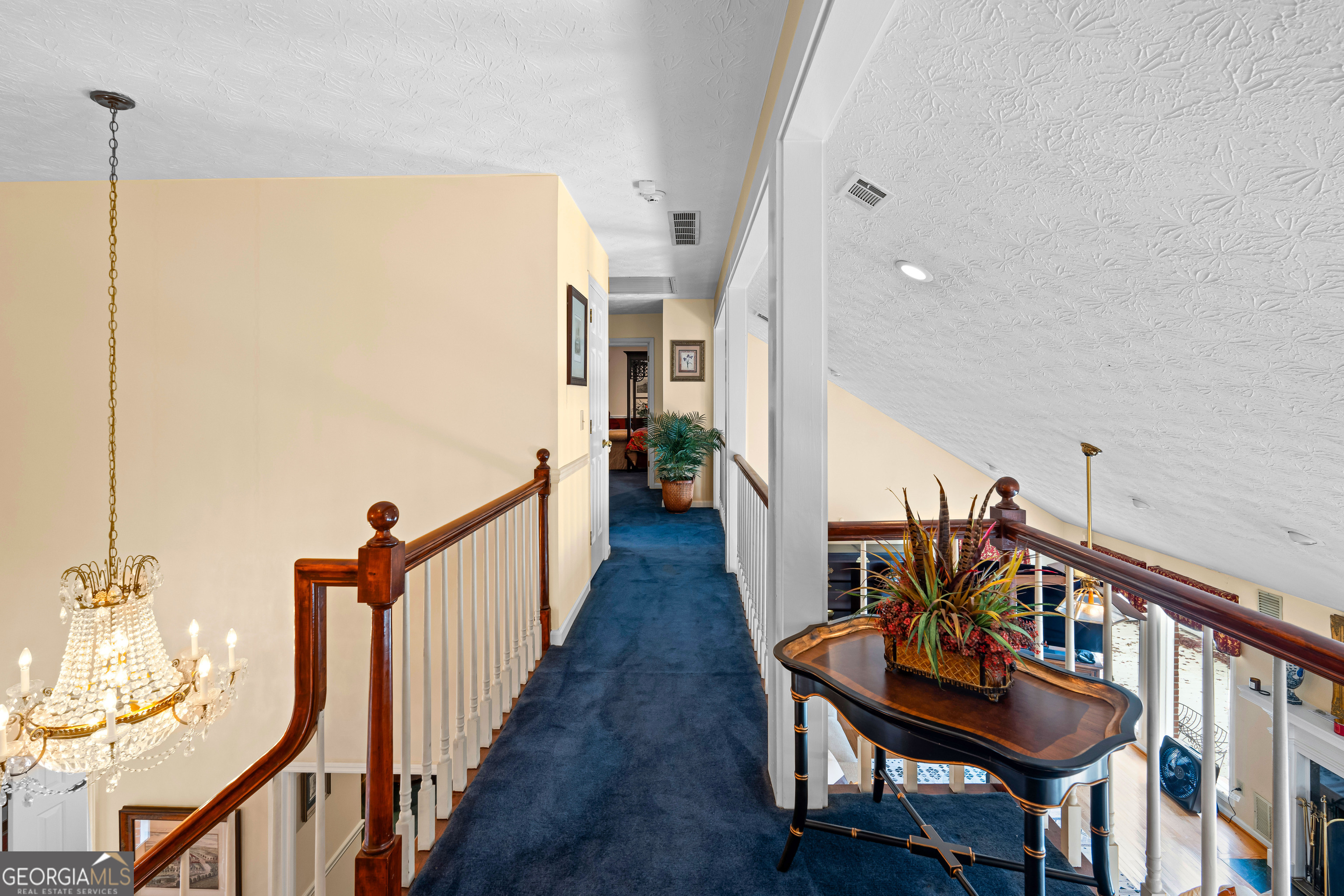 296 Ebenezer Church Road Fayetteville, GA 30215 - Photo 32 of 66 a view of a hallway with wooden floor and staircase