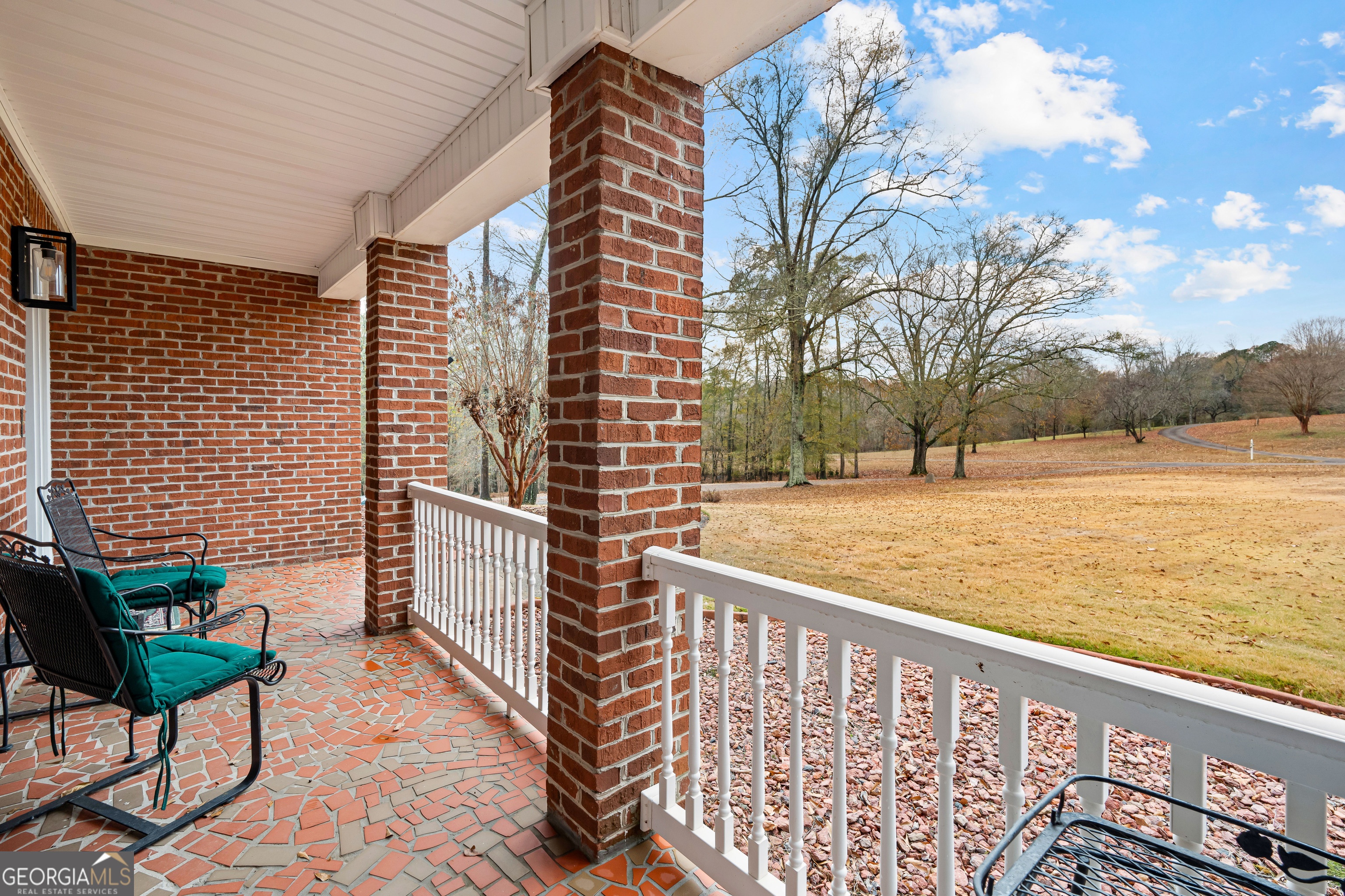 296 Ebenezer Church Road Fayetteville, GA 30215 - Photo 34 of 66 a view of balcony with wooden floor and seating space