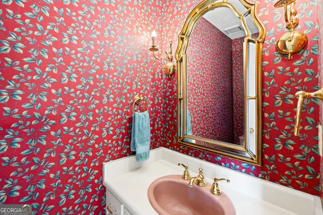 a spacious bathroom with a tub and shower