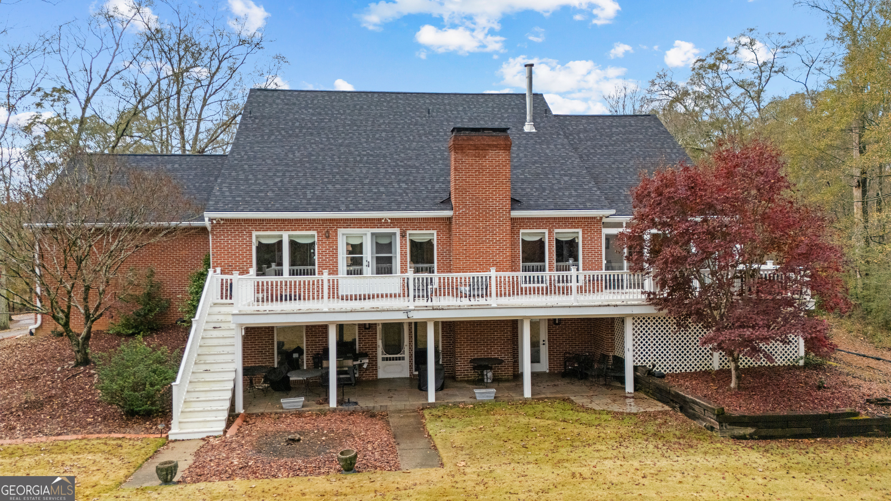 296 Ebenezer Church Road Fayetteville, GA 30215 - Photo 47 of 66 a view of house with outdoor seating area