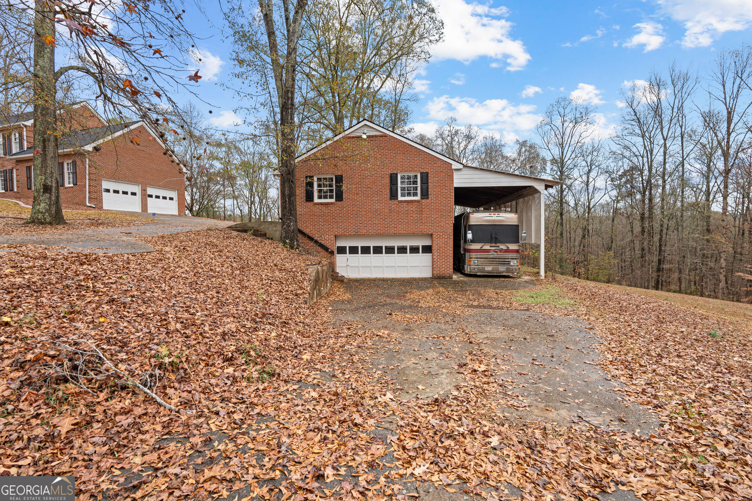 296 Ebenezer Church Road Fayetteville, GA 30215 - Photo 48 of 66 a view of a house with a yard covered in snow