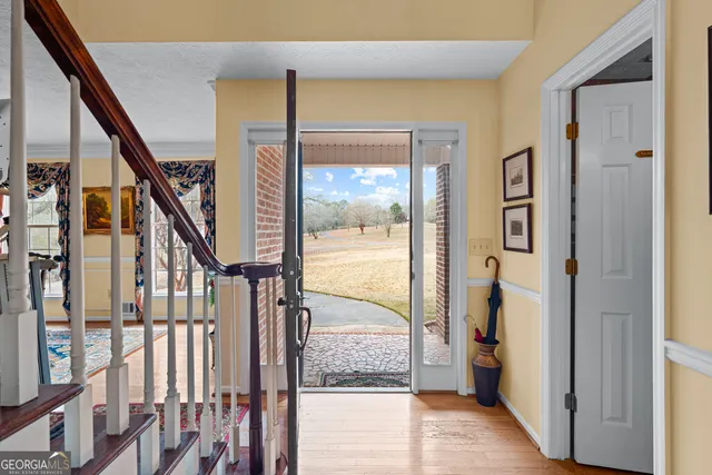 a view of entryway with a front door