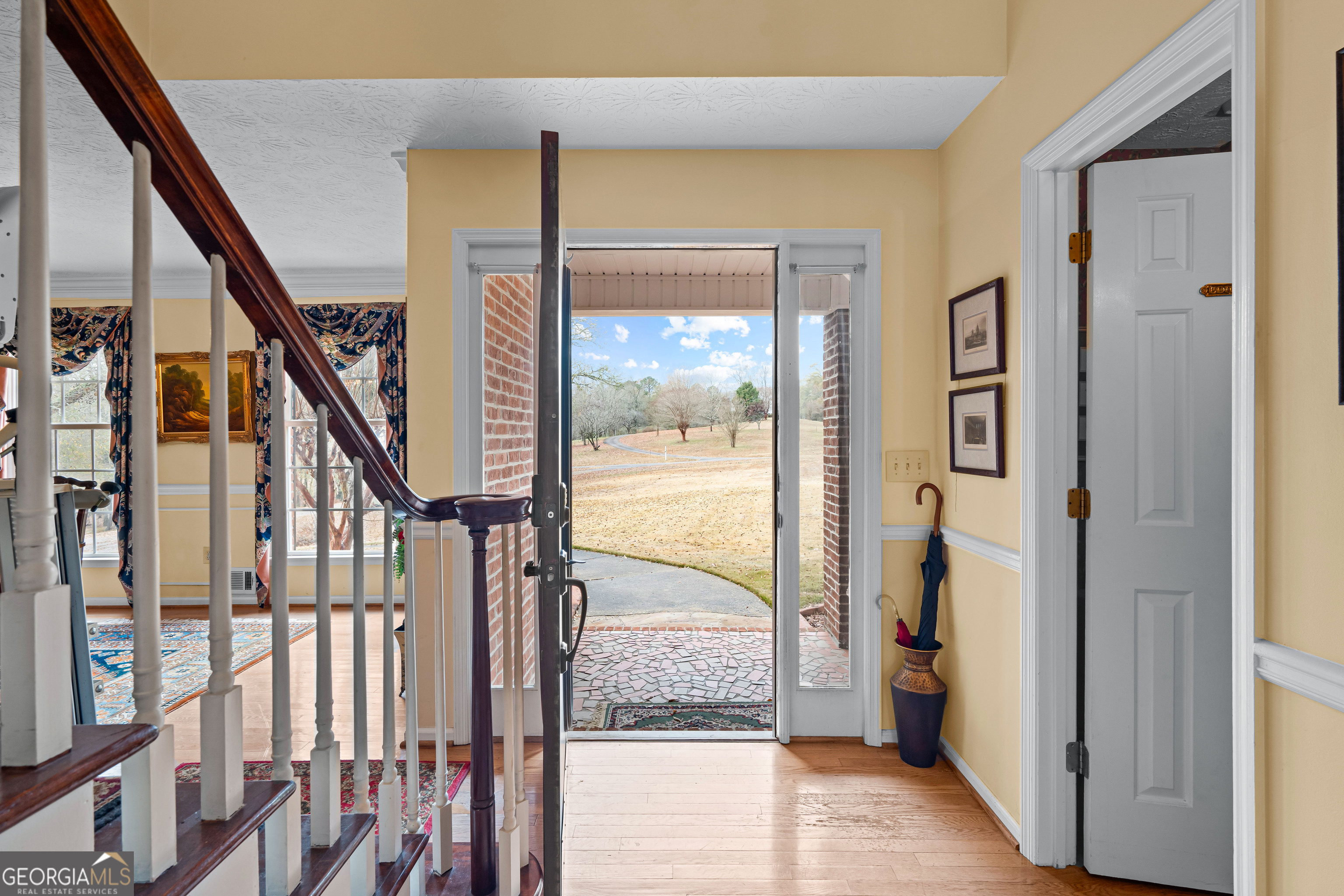296 Ebenezer Church Road Fayetteville, GA 30215 - Photo 5 of 66 a view of an entryway with a floor to ceiling window