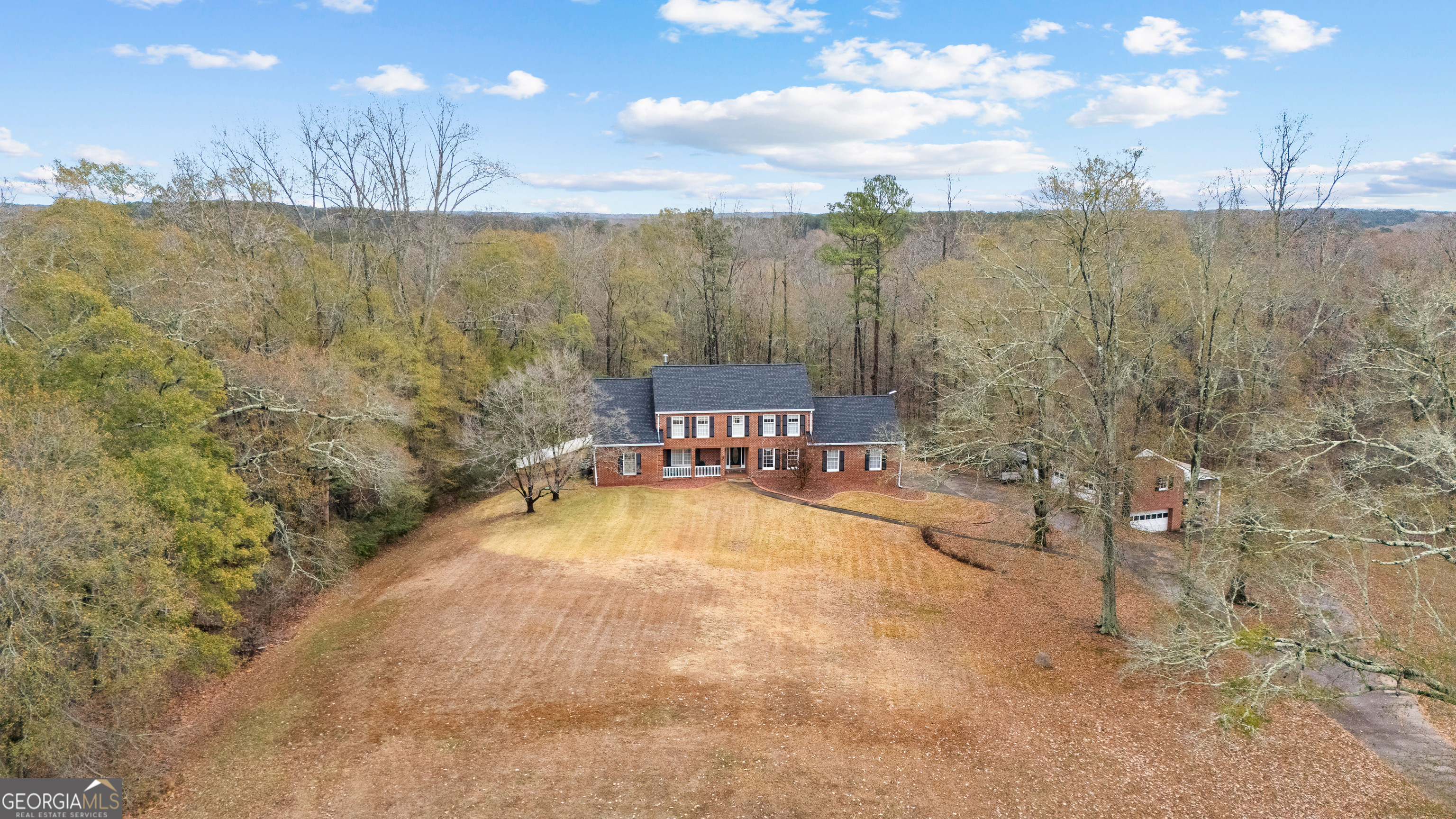 296 Ebenezer Church Road Fayetteville, GA 30215 - Photo 55 of 66 a view of a lake with a yard from a tub