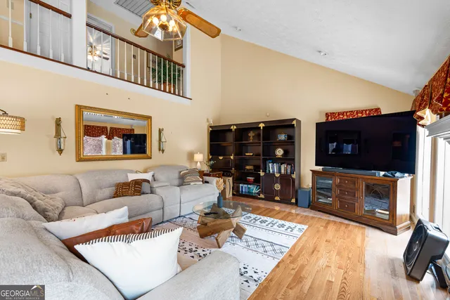 a large kitchen with stainless steel appliances granite countertop a stove and cabinets