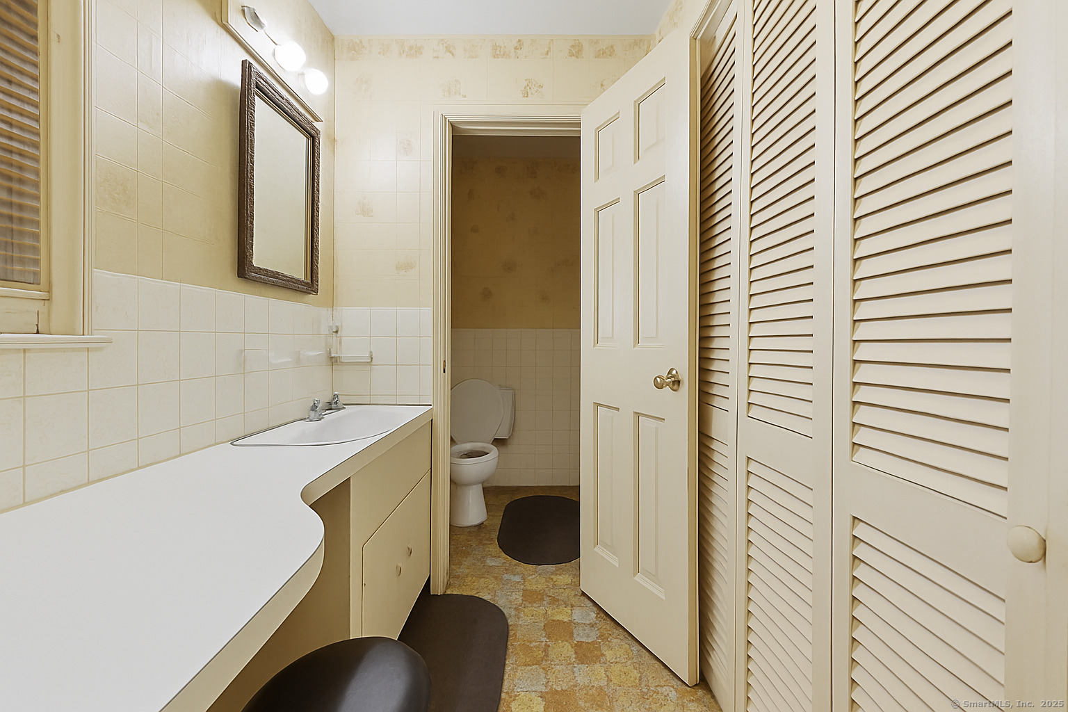 184 Putting Green Road Trumbull, CT 06611 - Photo 11 of 24 a bathroom with a sink a toilet and shower