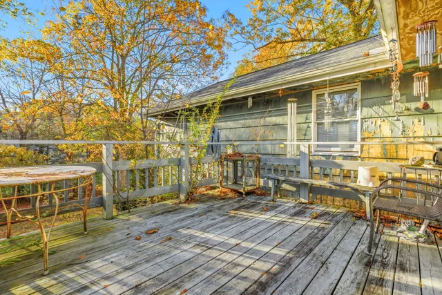a view of a brick house with many windows