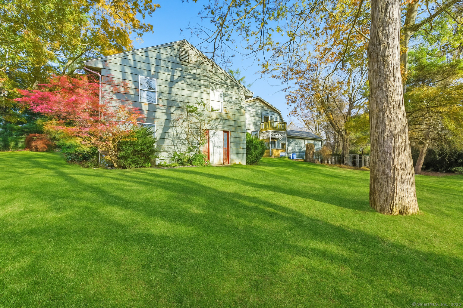 184 Putting Green Road Trumbull, CT 06611 - Photo 19 of 24 a view of large trees with a big yard and large trees