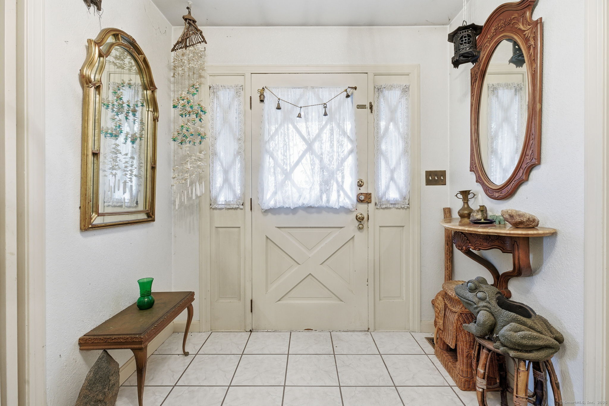 184 Putting Green Road Trumbull, CT 06611 - Photo 2 of 24 a view of an entryway with wooden floor