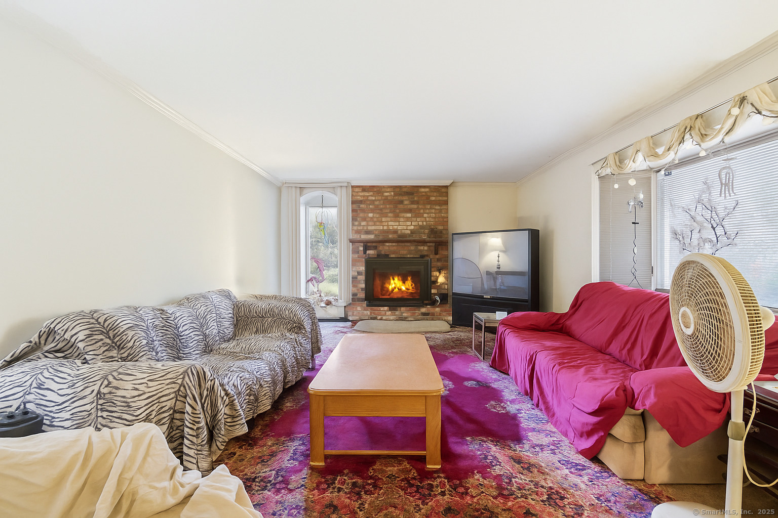 184 Putting Green Road Trumbull, CT 06611 - Photo 3 of 24 a living room with furniture and a couch