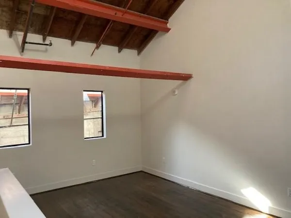 a view of small space with wooden floor