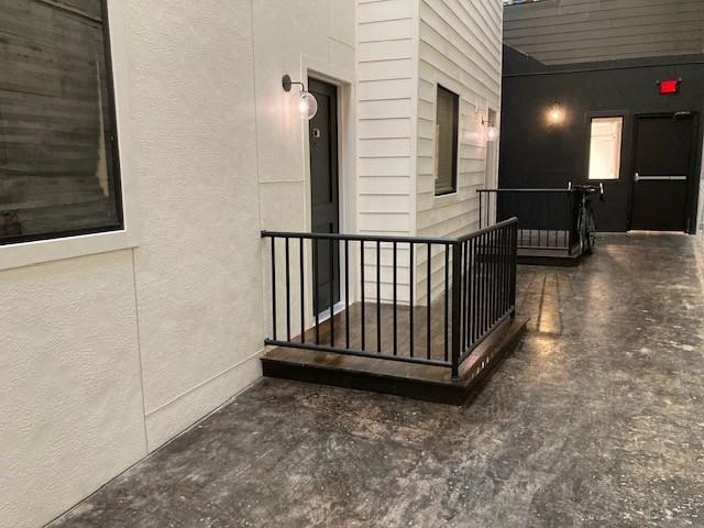 4411 Dallas Street, Unit 44 Houston, TX 77023 - Photo 3 of 16 a view of a porch with wooden floor
